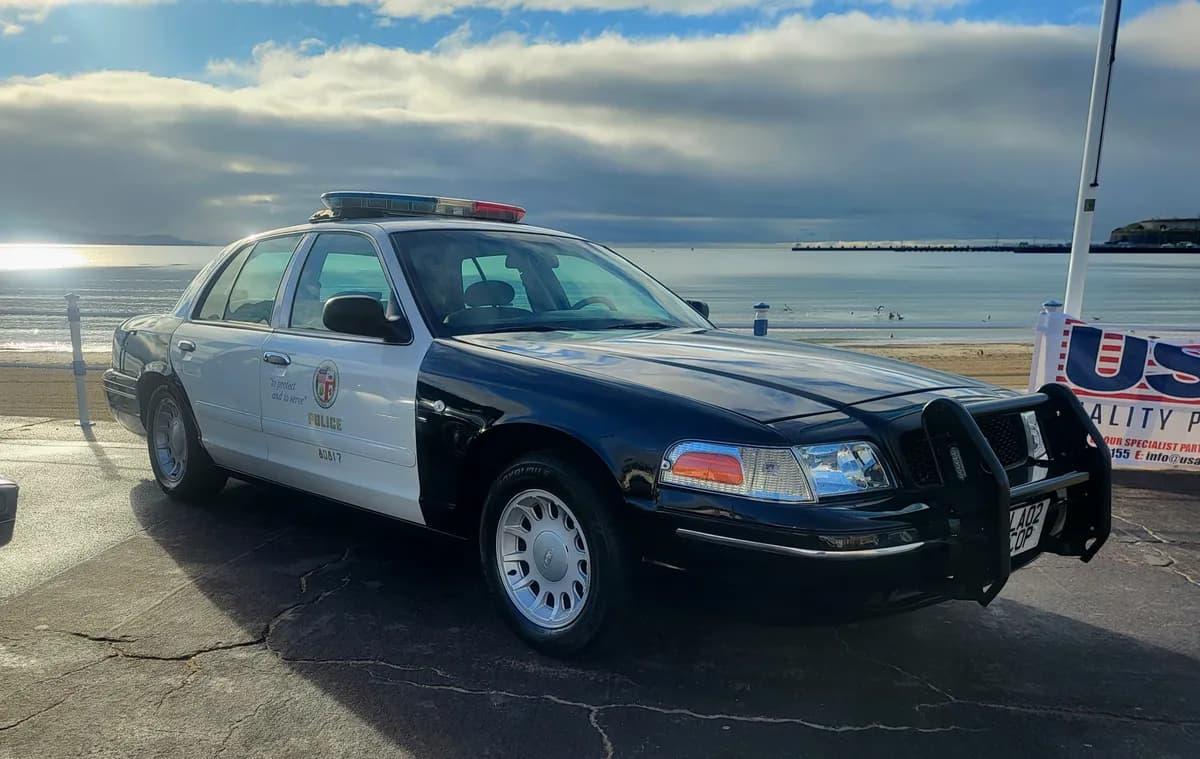 Police car by the beach